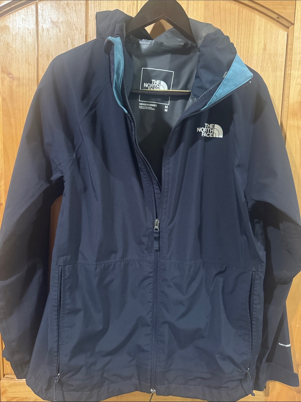 The North Face Men’s Navy Jacket with Light Blue Lining